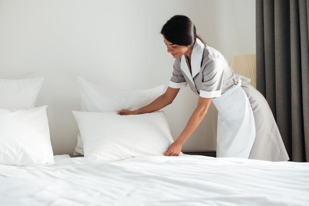 maid cleaning room